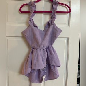 Lush purple ruffle shirt with cutout